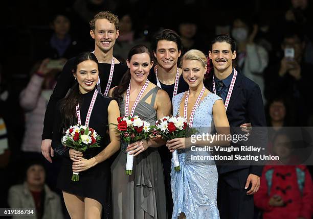 Madison Chock and Evan Bates of the USA win Silver, Tessa Virtue and Scott Moir of Canada win Gold and Piper Gilles and Paul Poirier of Canada win...