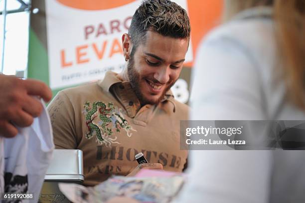 Italian rapper Emis Killa meeting fans and signing copies of his last album 'Terza Stagione' on October 29, 2016 in Livorno, Italy.