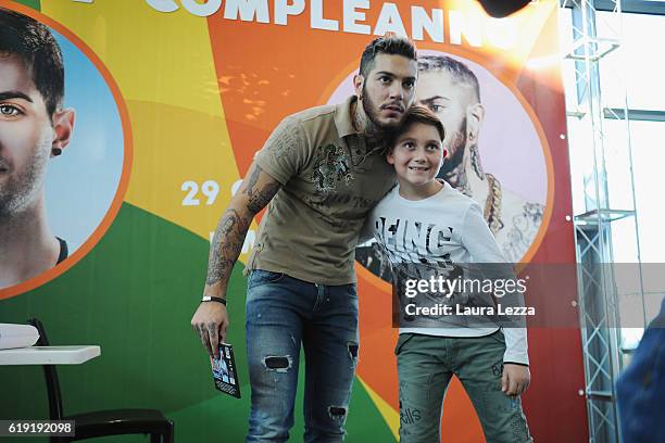 Italian rapper Emis Killa meeting fans and signing copies of his last album 'Terza Stagione' on October 29, 2016 in Livorno, Italy.