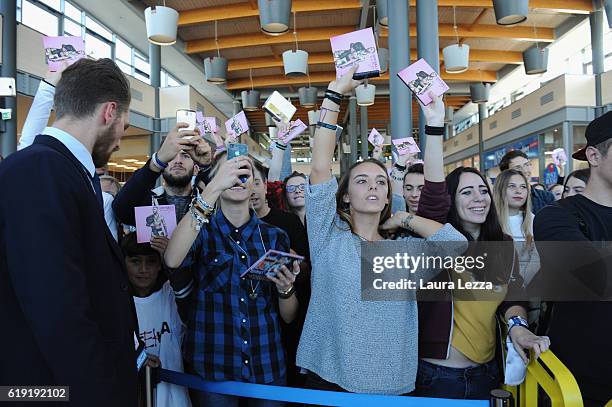 Italian rapper Emis Killa meeting fans and signing copies of his last album 'Terza Stagione' on October 29, 2016 in Livorno, Italy.