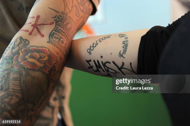 Italian rapper Emis Killa meeting fans and signing copies of his last album 'Terza Stagione' on October 29, 2016 in Livorno, Italy.