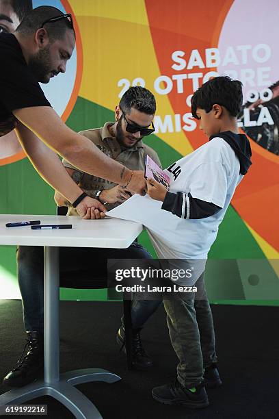 Italian rapper Emis Killa meeting fans and signing copies of his last album 'Terza Stagione' on October 29, 2016 in Livorno, Italy.