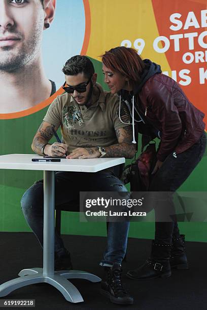 Italian rapper Emis Killa meeting fans and signing copies of his last album 'Terza Stagione' on October 29, 2016 in Livorno, Italy.