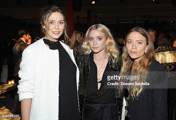 Actresses Elizabeth Olsen, Ashley Olsen and Mary Kate Olsen attend the 2016 LACMA Art + Film Gala Honoring Robert Irwin and Kathryn Bigelow Presented...