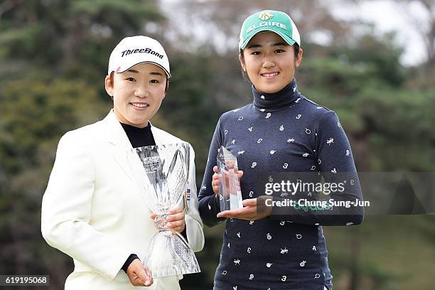 Jiyai Shin of South Korea and Mone Inami pose with the trophy after during a ceremony following the Mitsubishi Electric/Hisako Higuchi Ladies Golf...