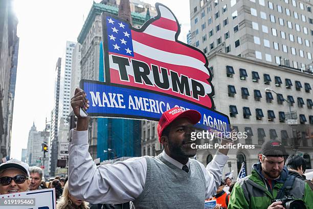 Over a hundred supporters of Republican Presidential nominee Donald J. Trump rallied on the sidewalk in front of Trump Tower on Manhattan's Fifth...