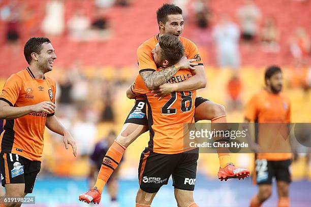 Brandon Borello of the Roar celebrates with team mate Jamie Maclaren after scoring a goal during the round four A-League match between the Brisbane...
