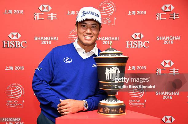 Hideki Matsuyama of Japan with the winners trophy after the final round of the WGC - HSBC Champions at the Sheshan International Golf Club on October...