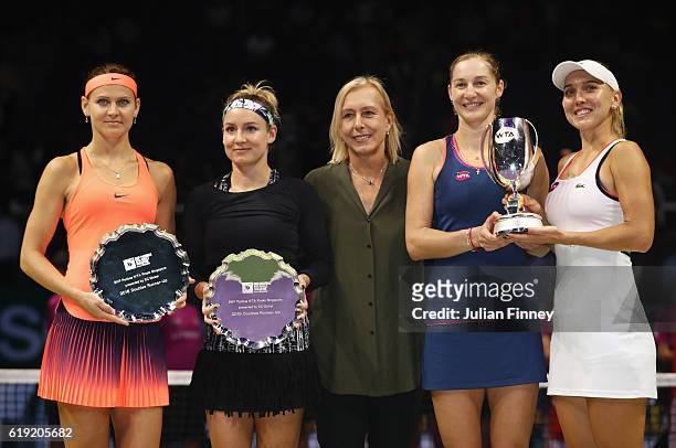 Champions Ekaterina Makarova and Elena Vesnina of Russia pose with Bethanie Mattek-Sands of the United States and Lucie Safarova of Czech Republic...