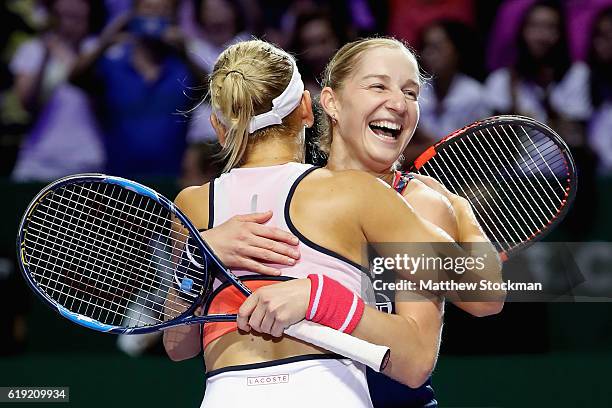 Ekaterina Makarova and Elena Vesnina of Russia celebrate victory in the doubles final match against Bethanie Mattek-Sands of the United States and...