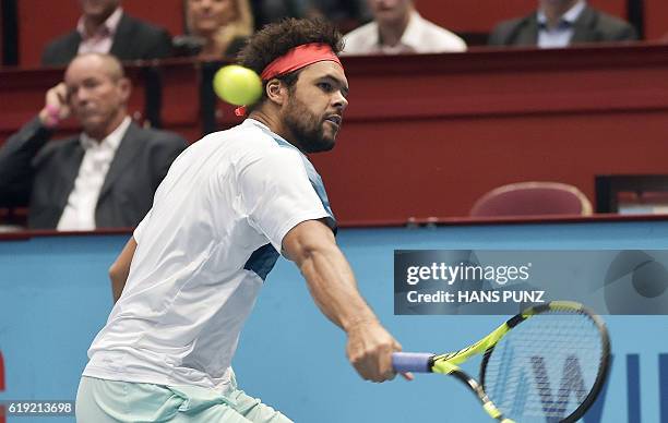 Jo-Wilfried Tsonga of France returns a ball during the final tennis match against Andy Murray of Great Britain at the ATP Erste Bank Open Tennis...