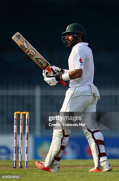 Misbah-ul-Haq of Pakistan celebrates after reacing his half century during Day One of the Third Test between Pakistan and West Indies at Sharjah...