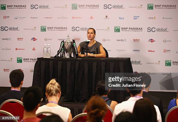 Dominika Cibulkova of Slovakia talks during a press conference after victory in her singles final against Angelique Kerber of Germany during day 8 of...