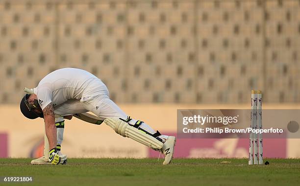 Ben Stokes reacts after being bowled during the third day of the second test match between Bangladesh and England at Shere Bangla National Stadium on...