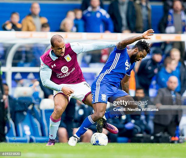 Gabriel Agbonlahor of Aston Villa is challenged by Jacques Maghoma of Birmingham City during the Sky Bet Championship match between Birmingham City...