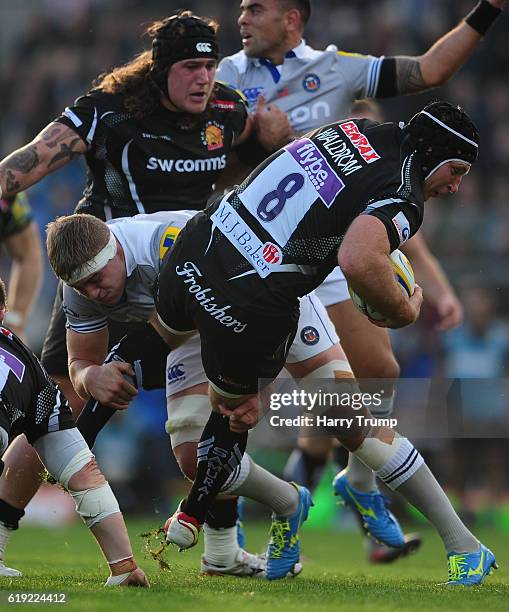 Thomas Waldrom of Exeter Chiefs is tackled by Tom Ellis of Bath Rugby during the Aviva Premiership match between Exeter Chiefs and Bath Rugby at...