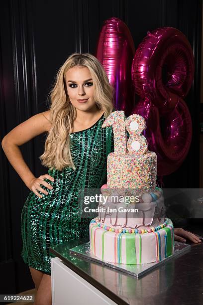 Tallia Storm poses for a photograph with her birthday cake whilst celebrating her 18th Birthday at the Rosewood Hotel on October 30, 2016 in London,...