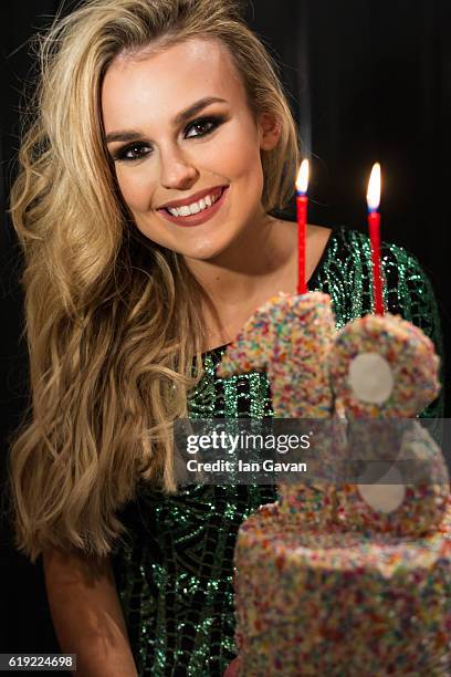 Tallia Storm poses for a photograph with her birthday cake whilst celebrating her 18th Birthday at the Rosewood Hotel on October 30, 2016 in London,...