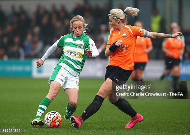 Nadia Lawrence of Yeovil Town attempts to take the ball past Emma Beckett of London Bees during the Women's Super League 2 match between London Bees...