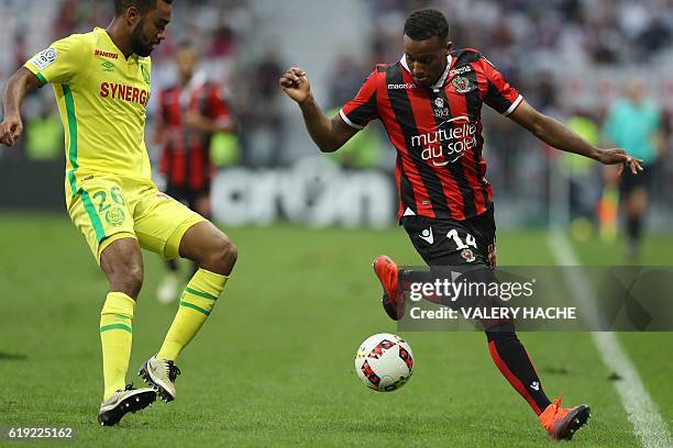 Nice's French forward Alassane Plea vies with Nantes' French defender Koffi Djidji during the French L1 football match Nice vs Nantes on October 30,...