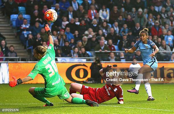 Nikita Parris of Manchester City attempts to lob Ann-Katrin Berger of Birmingham City during Women's Super League1 match between Manchester City and...