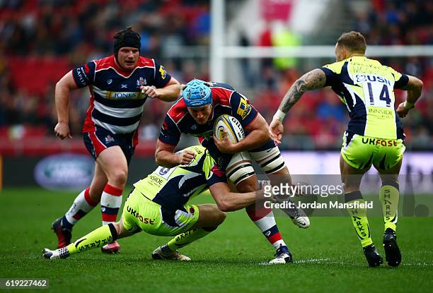 Jordan Crane of Bristol is tackled by Sam Jones of Sale during the Aviva Premiership match between Bristol Rugby and Sale Sharks at Ashton Gate on...