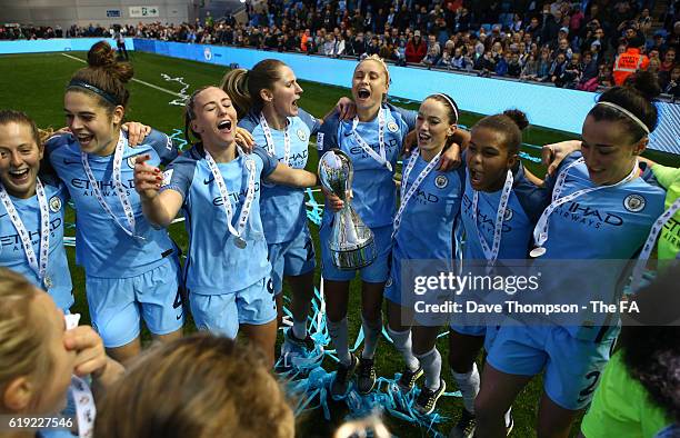 The Manchester City team celebrate after winning the Women's Super Leauge1 during Women's Super League1 match between Manchester City and Birmingham...