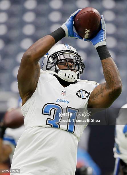 Rafael Bush of the Detroit Lions catches a pass during warm ups before the game against the Houston Texans at NRG Stadium on October 30, 2016 in...