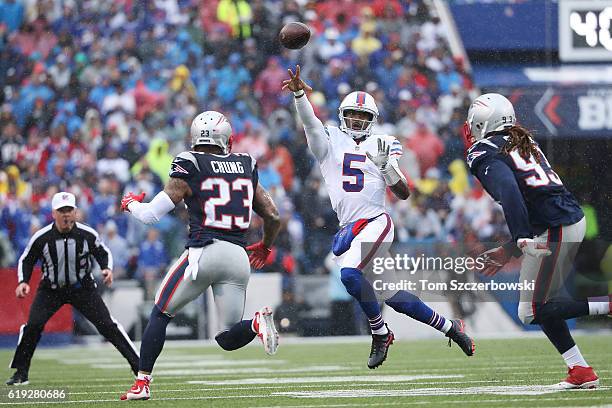 Tyrod Taylor of the Buffalo Bills throws for a completion against the New England Patriots during the first half at New Era Field on October 30, 2016...