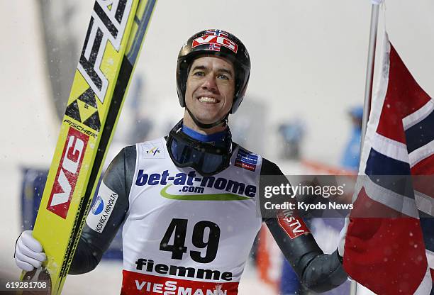 Italy - Anders Bardal of Norway celebrates after winning the men's normal hill individual ski jumping competition in Val di Fiemme, Italy, on Feb. 23...