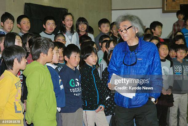 Japan - Japanese conductor Seiji Ozawa directs a choir at Minami-Ikuta Elementary School in Kawasaki, Kanagawa Prefecture, on Feb. 27, 2013. Ozawa...