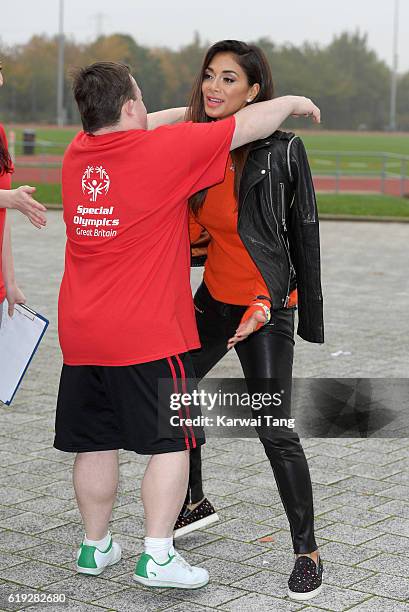 Special Olympics Global Ambassador Nicole Scherzinger attends a Special Olympics event at Lee Valley Athletics Indoor Arena on October 30, 2016 in...