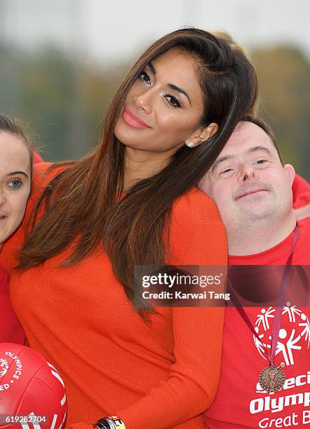 Special Olympics Global Ambassador Nicole Scherzinger attends a Special Olympics event at Lee Valley Athletics Indoor Arena on October 30, 2016 in...