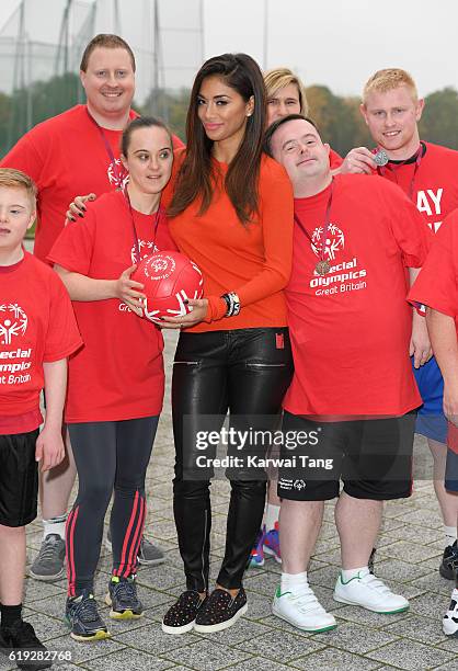 Special Olympics Global Ambassador Nicole Scherzinger attends a Special Olympics event at Lee Valley Athletics Indoor Arena on October 30, 2016 in...