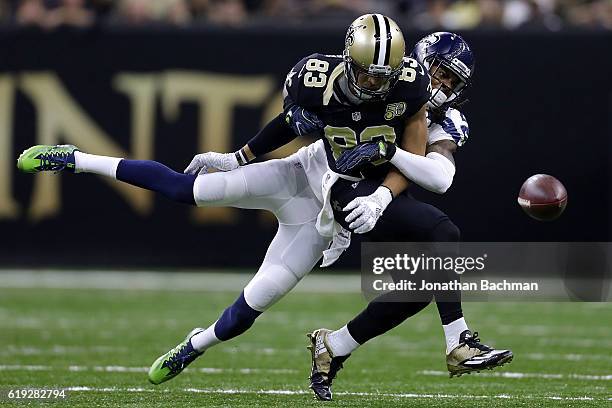 Richard Sherman of the Seattle Seahawks breaks up a pass intended for Willie Snead of the New Orleans Saints during the first half of a game at the...