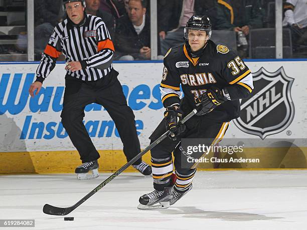 Nikita Korostelev of the Sarnia Sting skates with the puck against the London Knights during an OHL game at Budweiser Gardens on October 29, 2016 in...