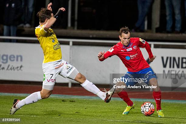 Anton Wede of Helsingborgs IF and David Svensson of Falkenbergs FF fight for the ball during the Allsvenskan match between Falkenbergs FF and...