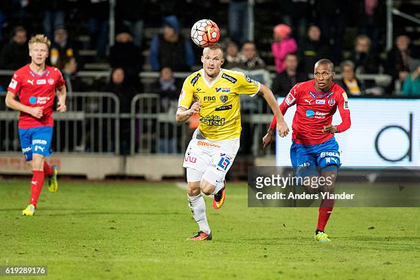 Rasmus Sjostedt of Falkenbergs FF and Bradley Ralani of Helsingborgs IF competes for the ball during the Allsvenskan match between Falkenbergs FF and...