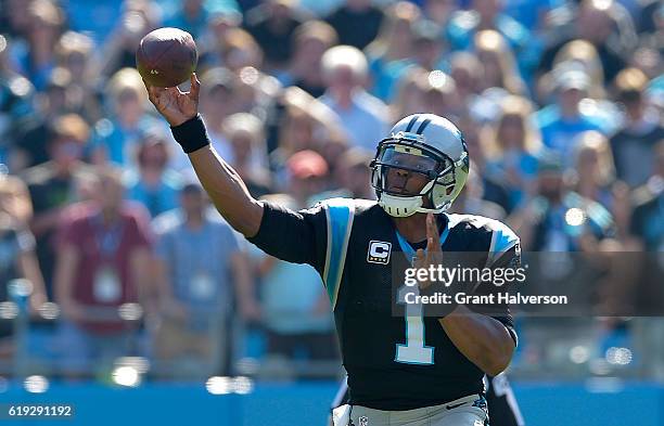 Cam Newton of the Carolina Panthers throws against the Arizona Cardinals during the game at Bank of America Stadium on October 30, 2016 in Charlotte,...