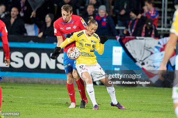 Frederik Helstrup Jensen of Helsingborgs IF and Jesper Karlsson of Falkenbergs FF fight for the ball during the Allsvenskan match between Falkenbergs...