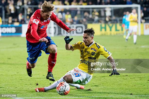 Martin Christensen of Helsingborgs IF and Kamal Mustafa of Falkenbergs FF competes for the ball during the Allsvenskan match between Falkenbergs FF...