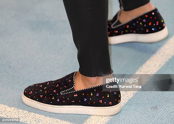 Special Olympics Global Ambassador Nicole Scherzinger, shoe detail, attends a Special Olympics event at Lee Valley Athletics Indoor Arena on October...