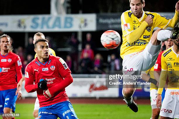 Tyrell Rusike of Helsingborgs IF and Stefan Rodevag of Falkenbergs FF fight for the ball during the Allsvenskan match between Falkenbergs FF and...