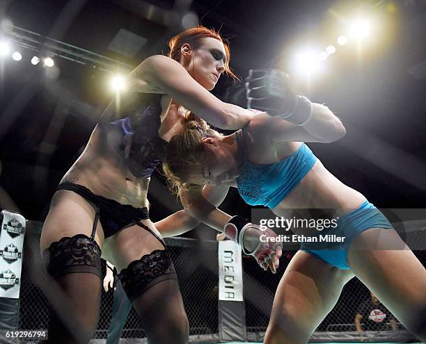Fighters Jolene "The Valkyrie" Hexx and Andreea "The Storm" Vladoi compete during Lingerie Fighting Championships 22: Costume Brawl I" at 4 Bears...