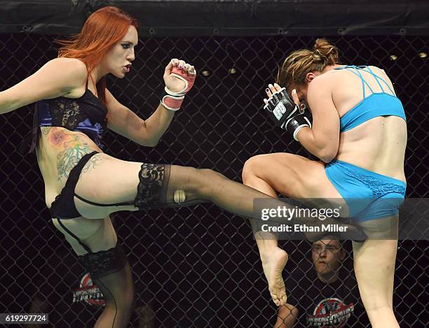 Fighters Jolene "The Valkyrie" Hexx and Andreea "The Storm" Vladoi compete during Lingerie Fighting Championships 22: Costume Brawl I" at 4 Bears...