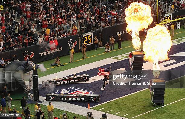 Vince Wilfork of the Houston Texans runs onto the field during player introductions before the game between the Houston Texans and the Detroit Lions...