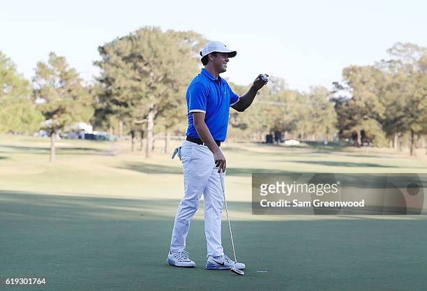Cody Gribble reacts to his putt after winning the tournament on the 18th hole during the Final Round of the Sanderson Farms Championship at the...