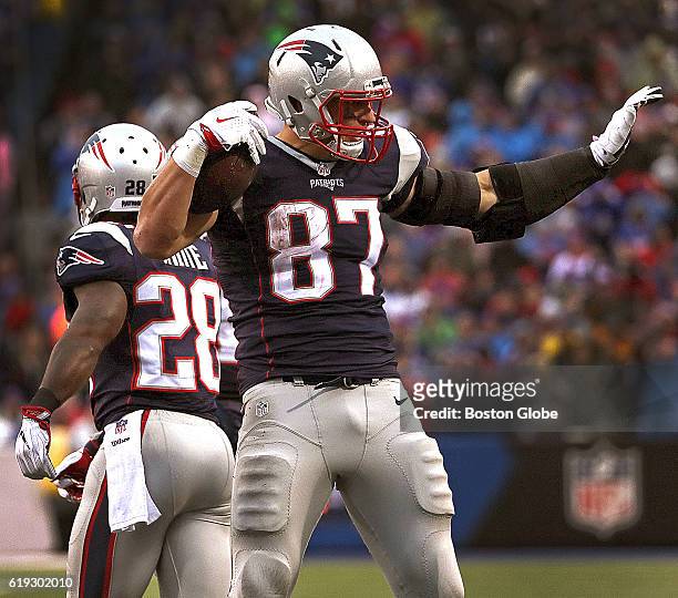 New England Patriots tight end Rob Gronkowski shows off his dance moves after a 33 yard catch and carry for a first down during the fourth quarter....