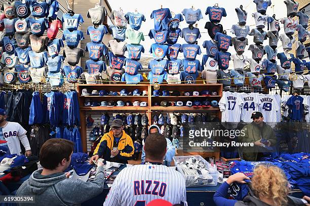 Vendor sells merchandise outside Wrigley Field before Game Five of the 2016 World Series between the Chicago Cubs and the Cleveland Indians at...