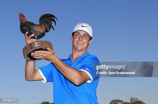 Cody Gribble poses with the trophy after winning the Final Round of the Sanderson Farms Championship at the Country Club of Jackson on October 30,...